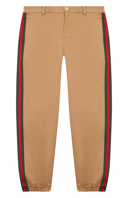 Детские хлопковые брюки GUCCI бежевого цвета по цене 39350 руб., арт. 573995/XWAEW | Фото 1